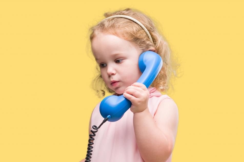 young girl talking on phone